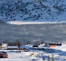 Su tutan Kars'taki Karakurt HES Barajı'nda kış güzelliği