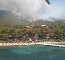 GÜNCELLEME – Marmaris'te oteller ve yerleşim yerlerine yakın ormanlık alanda çıkan yangına müdahale ediliyor