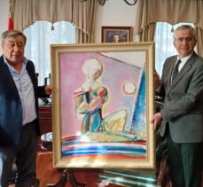 Kazak ressam tablosunu satarak Türkiye’deki depremzedeler için bağış yaptı