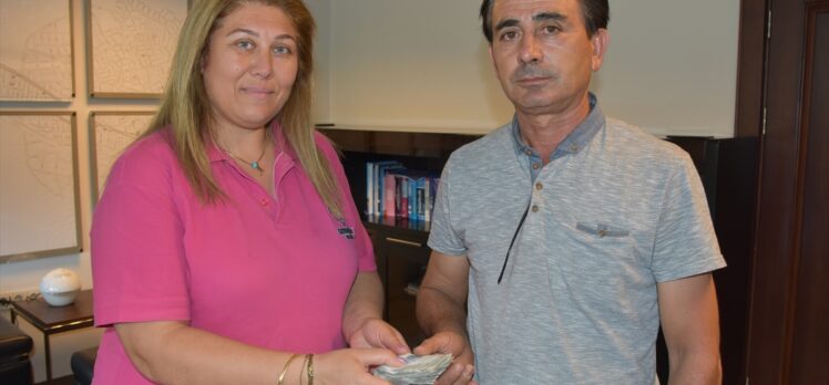 Aydın'da bağışlanan pantolonda bulunan para sahibine teslim edildi